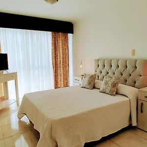 mendoza-suites-1.hotelsmendoza.com/